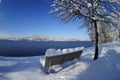 Snow-covered bench on the shore of Steckborn in Switzerland
