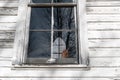 Lower section of a country church window with reflections