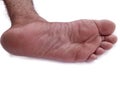 Lower side leg bare feet and sole Close-up on white background isolated