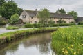Typical Cotswold cottages on the River Eye, Lower Slaughter, Gloucestershire, Cotswolds, England, UK Royalty Free Stock Photo