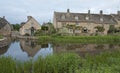 Typical Cotswold cottages on the River Eye, Lower Slaughter, Gloucestershire, Cotswolds, England, UK Royalty Free Stock Photo