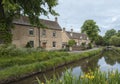 Typical Cotswold cottages on the River Eye, Lower Slaughter, Gloucestershire, Cotswolds, England, UK Royalty Free Stock Photo