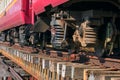 Lower view of trainst suspension on old wood railways bridge