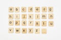 Lowercase alphabet letters on scrabble wooden blocks Royalty Free Stock Photo