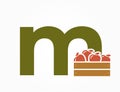 lowercase letter m with apple crate. fruit and organic food text logo. harvest and gardening design