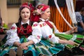 Girls dressed in polish national folk costumes from Lowicz region