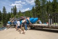 Lowman, Idaho - July 1, 2019: Whitewater Rafting groups prepare to launch a raft for a river rafting trip down the ramp for a trip Royalty Free Stock Photo