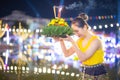 Loy Krathong Traditional Festival, A beautiful Thai woman holds a Krathong ornamental form banana leafs in Loy Krathong