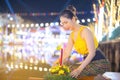 Loy Krathong Traditional Festival, A beautiful Thai woman holds a Krathong ornamental form banana leafs in Loy Krathong