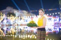 Loy Krathong Traditional Festival, A beautiful Thai woman holds a Krathong ornamental form banana leafs in Loy Krathong