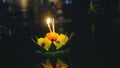 Loy Kratong Festival celebrated in Thailand. Launch boats from flowers and candles in a pond