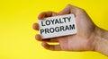 Loyalty program card in hand isolated Royalty Free Stock Photo