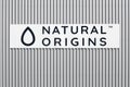 Natural Origins logo on a building