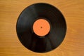 LP old vinyl record on the wooden table Royalty Free Stock Photo