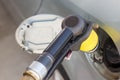 LPG car gas pump nozzle connected to the car`s fuel tank. Alternative fuel options Royalty Free Stock Photo