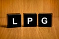 LPG or liquefied petroleum gas word on black block Royalty Free Stock Photo