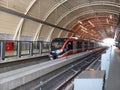 LRT Train in Station with Curved Roof Royalty Free Stock Photo