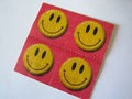 Lsd stick papers smile face retro psychedelic macro vintage background prints Royalty Free Stock Photo