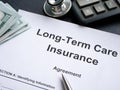 LTC Long-Term care insurance agreement and pen. Royalty Free Stock Photo