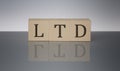 LTD concept, wooden word block on the grey background Royalty Free Stock Photo