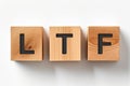 LTF or Long Term Equity Fund word on wooden cube on white board background. Business financial concept Royalty Free Stock Photo