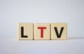 LTV - Life Time Value symbol. Concept word LTV on wooden cubes. Beautiful white background. Business and LTV concept. Copy space Royalty Free Stock Photo