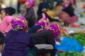 Luang Namtha, Laos - circa november, 2019: portrait adult Akha woman at market wearing traditional clothings belonging to minority