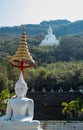 Buddha Sakkol Sima Mongkol or Luang Por Khao at the base and on Si Siat Mountain at Wat Theppitak Punnaram,Phaya Yen,Pakchong dist Royalty Free Stock Photo