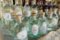 Bottles with locally produced rice alcohol in a street shop in Ban Xabg Hay village inn Luang Prabang, Laos.