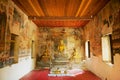 Buddha statues and interior of the Wat Pa Huak temple in Luang Prabang, Laos.