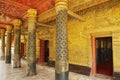 Elaborate golden facade decoration of the Wat Xieng Thong Buddhist temple in Luang Prabang, Laos.