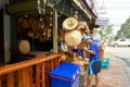 LUANG PRABANG, LAOS - APRIL 17. 2019 : Local selling food at the morning market in Luang Prabang, Laos