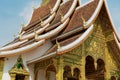 Roof and facade wall decoration of the Haw Pha Bang Buddhist temple at the Royal Palace Museum in Luang Prabang, Laos. Royalty Free Stock Photo