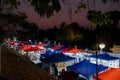 Luang Prabang, Laos - February 25 , 2023: Colorful night market near the Royal Palace Museum