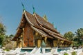 Luang Prabang, Laos-February 26,2020.Golden Buddhist temple Wat Xieng Thong is important Lao monastery. Traditional Asian art and Royalty Free Stock Photo