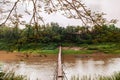 Handmade bamboo bridge on Nam Khan river in Luang Prabang, Laos