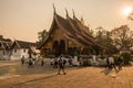 Luang Prabang, Laos : March-01-2019 : Group of tourist visiting Wat Xieng Thong an iconic temple in Luang Prabang, the UNESCO worl
