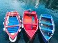 LUARCA, SPAIN - DECEMBER 4, 2016: Three bright painted boats at