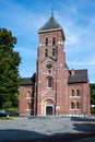 Lubbeek, Flemish Brabant Region, Belgium - Catholic brick stone church of the village Royalty Free Stock Photo