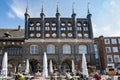 Lubeck, Germany, April 17, 2023: Facade of the historic Luebeck town hall in dark brick architecture at the market place with a