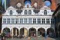 Lubeck, Germany, April 17, 2023: Renaissance facade of the historic Luebeck town hall in front of other historic parts in brick