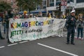 Lubeck, Germany, September 24, 2021: Young people holding a protest banner with a colorful german slogan, that means Climate