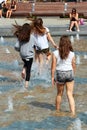 Children play in the city fountain in Lublin, Poland Royalty Free Stock Photo