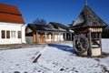 Lublin, Poland. 08 February 2023. old shops and historic well in market square in provincial town in Poland as seen in