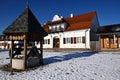 Lublin, Poland. 08 February 2023. old shops and historic well in market square in provincial town in Poland as seen in