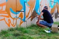 Lublin, Poland 08/04/2019 graffiti artist painting during street art festival