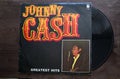 Lublin, Poland. 18 January 2023.Johnny Cash Greatest Hits long play on dark wooden table