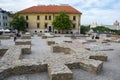 LUBLIN, POLAND - JUNE 02, 2016. The Po Farze Square with reconstructed foundations of the former temple, and royal castle in back