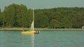 Young Men Taking Down a Sail on the Yacht