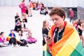 Lublin, Poland 02 September 2023 young man wearing rainbow flag at pride parade